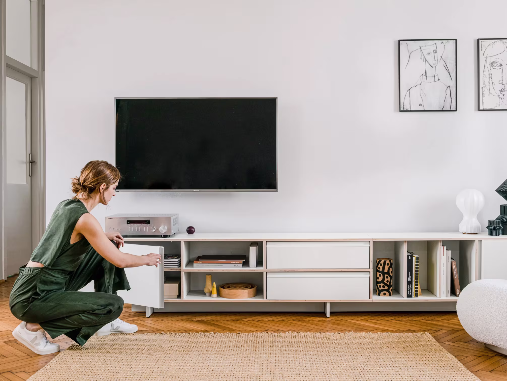 A TV stand in a furnished room